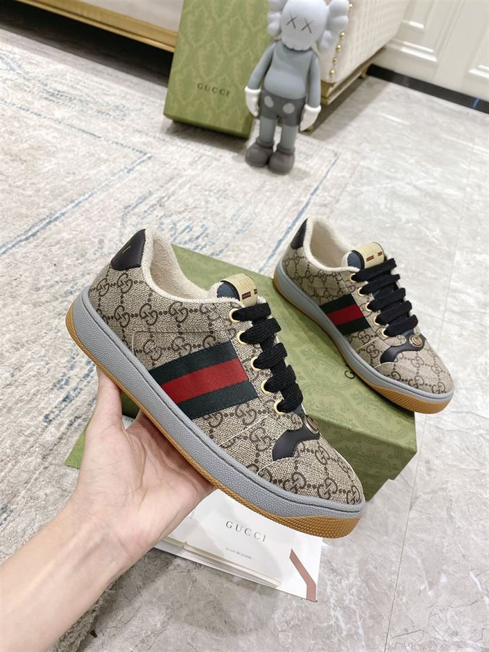 Gvc*1 MEN S SCREENER SNEAKER IN BEIGE AND EBONY GG Svp*me GCC055