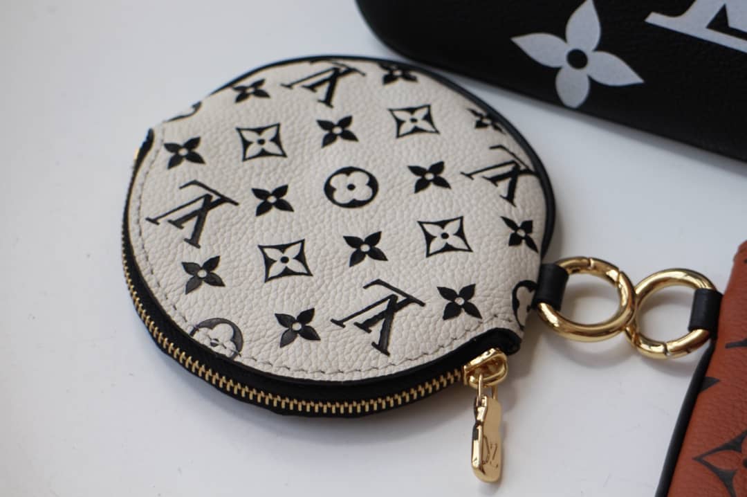 L0vis Vvtt0n Crafty Trio Pouch Monogram Empreinte Replica M69516